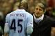 LIVERPOOL, ENGLAND - NOVEMBER 27: Manchester City Manager Roberto Mancini speaks to Mario Balotelli as he heads for the dressing room after being sent off during the Barclays Premier League match between Liverpool and Manchester City at Anfield on November 27, 2011 in Liverpool, England. (Photo by Alex Livesey/Getty Images)