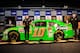 FORT WORTH, TX - NOVEMBER 04: Danica Patrick unveils her #10 GoDaddy.com Chevrolet for the 2012 season with team owner Tony Stewart following practice for the NASCAR Sprint Cup Series AAA Texas 500 at Texas Motor Speedway on November 4, 2011 in Fort Worth, Texas. (Photo by John Harrelson/Getty Images for NASCAR)