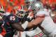 CHAMPAIGN, IL - OCTOBER 15: Whitney Mercilus #85 of the Illinois Fighting Illini rushes against Jack Mewhort #74 of the Ohio State Buckeyes at Memorial Stadium on October 15, 2011 in Champaign, Illinois. Ohio State defeated Illinois 17-7. (Photo by Jonathan Daniel/Getty Images)