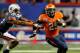 ATLANTA, GA - DECEMBER 31: Kevin Parks #25 of the Virginia Cavaliers against Demetruce McNeal #12 of the Auburn Tigers during the 2011 Chick Fil-A Bowl at Georgia Dome on December 31, 2011 in Atlanta, Georgia. (Photo by Kevin C. Cox/Getty Images)