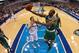 DALLAS, TX - FEBRUARY 20: Avery Bradley #0 of the Boston Celtics takes a shot against Dirk Nowitzki #41 of the Dallas Mavericks at American Airlines Center on February 20, 2012 in Dallas, Texas. NOTE TO USER: User expressly acknowledges and agrees that, by downloading and/or using this Photograph, user is consenting to the terms and conditions of the Getty Images License Agreement. (Photo by Ronald Martinez/Getty Images)