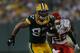 GREEN BAY, WI - SEPTEMBER 1: Vic So'oto #97 of the Green Bay Packers runs for a touchdown on an interception during a preseason game against the Kansas City Chiefs at Lambeau Field on September 1, 2011 in Green Bay, Wisconsin. (Photo by Scott Boehm/Getty Images)
