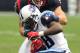 HOUSTON, TX - January 01: Inside linebacker Brian Cushing #56 of the Houston Texans running back Chris Johnson #28 of the Tennessee Titans of the Tennessee Titans on January 1, 2012 at Reliant Stadium in Houston, Texas. (Photo by Thomas B. Shea/Getty Images)