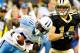 NEW ORLEANS, LA - SEPTEMBER 01: Jason McCourty #30 of the Tennessee Titans returns a fumble while being chased by Andy Tanner #14 of the New Orleans Saints during their pre season game at Louisiana Superdome on September 1, 2011 in New Orleans, Louisiana (Photo by Sean Gardner/ Getty Images)