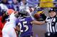 BALTIMORE, MD - DECEMBER 24: Field judge Greg Gautreaux calls pass interference on Chris Carr #25 of the Baltimore Ravens as Carr goes up for pass with Josh Cribbs #16 of the Cleveland Browns at M&T Bank Stadium on December 24, 2011 in Baltimore, Maryland. (Photo by Rob Carr/Getty Images)