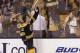 BOSTON, MA - MARCH 19: Brian Rolston #12 of the Boston Bruins hands a fan his stick after being named first star of the game against the Toronto Maple Leafs at the TD Garden on March 19, 2012 in Boston, Massachusetts. The Bruins defeated the Maple Leafs 8-0. (Photo by Bruce Bennett/Getty Images)