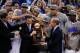 NEW ORLEANS, LA - APRIL 02: Head coach John Calipari and Kentucky President Eli Capilouto hold the trophy after the Wildcats defeat the Kansas Jayhawks 67-59 in the National Championship Game of the 2012 NCAA Division I Men's Basketball Tournament at the Mercedes-Benz Superdome on April 2, 2012 in New Orleans, Louisiana. (Photo by Chris Graythen/Getty Images)