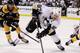 BOSTON, MA - APRIL 03: Sidney Crosby #87 of the Pittsburgh Penguins heads for the net as Benoit Pouliot #67 of the Boston Bruins defends on April 3, 2012 at TD Garden in Boston, Massachusetts. (Photo by Elsa/Getty Images)
