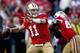 SAN FRANCISCO, CA - JANUARY 14: Alex Smith #11 of the San Francisco 49ers looks to pass from the pocket in the fourth quarter of the NFC Divisional playoff game against the New Orleans Saints at Candlestick Park on January 14, 2012 in San Francisco, California. (Photo by Jed Jacobsohn/Getty Images)
