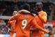 SWANSEA, UNITED KINGDOM - APRIL 06: Papiss Cisse of Newcastle United celebrates scoring the opening goal with Demba Ba (R) and team mates during the Barclays Premier League match between Swansea City and Newcastle United at the Liberty Stadium on April 6, 2012 in Swansea, United Kingdom. (Photo by Michael Steele/Getty Images)
