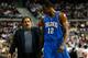 AUBURN HILLS, MI - MAY 13: Head coach Stan Van Gundy and Dwight Howard #12 of the Orlando Magic walk towards the bench against the Detroit Pistons in Game Five of the Eastern Conference Semifinals during the 2008 NBA Playoffs at the Palace of Auburn Hills in Auburn Hills, Michigan. NOTE TO USER: User expressly acknowledges and agrees that, by downloading and or using this photograph, User is consenting to the terms and conditions of the Getty Images License Agreement. (Photo by Gregory Shamus/Getty Images)
