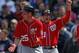 LaRoche and Zimmerman celebrate their comeback victory on Saturday afternoon.