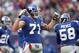 EAST RUTHERFORD, NJ - DECEMBER 7: Dave Tollefson #71 of the New York Giants reacts on the field against the Philadelphia Eagles at Giants Stadium on December 7, 2008 in East Rutherford, New Jersey. (Photo by Nick Laham/Getty Images)