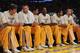 LOS ANGELES, CA - APRIL 06: Los Angeles Lakers wear 'NBA Green' shirts on the bench during the game against the Houston Rockets at Staples Center on April 6, 2012 in Los Angeles, California. NOTE TO USER: User expressly acknowledges and agrees that, by downloading and or using this photograph, User is consenting to the terms and conditions of the Getty Images License Agreement. (Photo by Harry How/Getty Images)