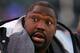 OAKLAND, CA - DECEMBER 17: Warren Sapp #99 of the Oakland Raiders talks with teammates on the sidelines toward the end of the NFL game against the St. Louis Rams at McAfee Coliseum December 17, 2006 in Oakland, California. (Photo by Jed Jacobsohn/Getty Images)