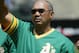 OAKLAND, CA - AUGUST 2: Baseball hall of famer Reggie Jackson of the 1973 World Champion Oakland Athletics waves to the crowd during a ceremony before the game against the New York Yankees at the Network Associates Coliseum on August 2, 2003 in Oakland, California. The Yankees defeated the Athletics 10-7. (Photo by Justin Sullivan/Getty Images)