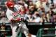 PITTSBURGH, PA - APRIL 05: Carlos Ruiz #51 of the Philadelphia Phillies hits a sacrifice fly in the 7th inning against the Pittsburgh Pirates during the Opening Day game on April 5, 2012 at PNC Park in Pittsburgh, Pennsylvania. (Photo by Jared Wickerham/Getty Images)