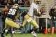 ORLANDO, FL - DECEMBER 29: Quarterback E. J. Manuel #3 of the Florida State Seminoles dodges the pas rush of the Notre Dame Fighting Irish in the Champs Sports Bowl December 29, 2011 at the Florida Citrus Bowl in Orlando, Florida. (Photo by Al Messerschmidt/Getty Images)
