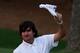 Bubba Watson holds up his visor after winning the 2012 Masters Tournament on the 10th hole at Augusta National Golf Club Sunday.