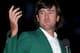 AUGUSTA, GA - APRIL 08: Bubba Watson of the United States gestures after his one-stroke playoff victory to win the 2012 Masters Tournament during the green jacket presentation at Augusta National Golf Club on April 8, 2012 in Augusta, Georgia. (Photo by Andrew Redington/Getty Images)