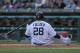 DETROIT, MI - APRIL 07: Prince Fielder #28 of the Detroit Tigers sits on the ground after getting hit by a pitch from Matt Albers #32 of the Boston Red Sox in the seventh inning of the game at Comerica Park on April 7, 2012 in Detroit, Michigan. The Tigers defeated the Red Sox 10-0. (Photo by Leon Halip/Getty Images)