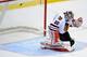 ST PAUL, MN - APRIL 5: Corey Crawford #50 of the Chicago Blackhawks reacts as the puck goes over him on a shot by Devin Setoguchi #10 of the Minnesota Wild during the shootout on April 5, 2012 at Xcel Energy Center in St Paul, Minnesota. The Wild defeated the Blackhawks 2-1 in a shootout. (Photo by Hannah Foslien/Getty Images)