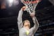 DENVER, CO - APRIL 03: Head coach Kim Mulkey of the Baylor Bears is held up by her players including Brittney Griner #42 (R) as she cuts down a piece of the net in celebration of their 80-61 win against the Notre Dame Fighting Irish during the National Final game of the 2012 NCAA Division I Women's Basketball Championship at Pepsi Center on April 3, 2012 in Denver, Colorado. (Photo by Doug Pensinger/Getty Images)