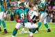 MIAMI - OCTOBER 4: Cameron Wake #91 of the Miami Dolphins celebrates after a play against the New England Patriots at Sun Life Field on October 4, 2010 in Miami, Florida. (Photo by Scott Cunningham/Getty Images)