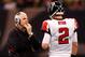 NEW ORLEANS - DECEMBER 07: Head coach Mike Smith talks with quarterback Matt Ryan #2 of the Atlanta Falcons throws a pass against the New Orleans Saints on December 7, 2008 at the Superdome in New Orleans, Louisiana. The Saints defeated the Falcons 29-25. (Photo by Chris Graythen/Getty Images)