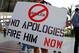 MIAMI, FL - APRIL 10: Protesters rally outside a press conference held by Miami Marlins Manager Ozzie Guillen for comments made about Fidel Castro at Marlins Park on April 10, 2012 in Miami, Florida. The Marlins suspended Guillen for five games over his pro-Castro comments. (Photo by Mike Ehrmann/Getty Images)