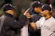 BALTIMORE, MD - APRIL 10: Manager Joe Girardi (L) celebrates with Derek Jeter #2 of the New York Yankees after beating the Baltimore Orioles 5-4 in 12 innings at Oriole Park at Camden Yards on April 10, 2012 in Baltimore, Maryland. (Photo by Rob Carr/Getty Images)