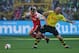 DORTMUND, GERMANY - SEPTEMBER 18: Jen Jeremies of Munich in action against Jan Koller of Dortmund during The Bundesliga match between Borussia Dortmund and Bayern Munich at The Westfallen Stadium on September 18, 2004 in Dortmund, Germany. (Photo by Stuart Franklin/Getty Images)