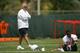 DAVIE, FL - MAY 02: Executive Vice President of Football Operations Bill Parcells (L) walks past a player at practice on during Miami Dolphins Rookie Mini Camp on May 2, 2008 at the Dolphins practice facility in Davie, Florida. (Photo by Marc Serota/Getty Images)