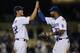 LOS ANGELES, CA - JUNE 20: Starting pitcher Clayton Kershaw #22 and center fielder Matt Kemp #27 of the Los Angeles Dodgers celebrate after Kershaw's complete game shoutout against the Detroit Tigers on June 20, 2011 at Dodger Stadium in Los Angeles, California. The Dodgers won 4-0. (Photo by Stephen Dunn/Getty Images)