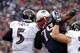 FOXBORO, MA - JANUARY 22: Joe Flacco #5 of the Baltimore Ravens gets tackled by Vince Wilfork #75 of the New England Patriots during their AFC Championship Game at Gillette Stadium on January 22, 2012 in Foxboro, Massachusetts. (Photo by Jim Rogash/Getty Images)