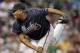HOUSTON - APRIL 09: Livan Hernandez #61 of the Atlanta Braves throws against the Houston Astros at Minute Maid Park on April 9, 2012 in Houston, Texas. (Photo by Bob Levey/Getty Images)