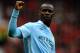 MANCHESTER, ENGLAND - OCTOBER 23: Mario Balotelli of Manchester City celebrates scoring his team's second goal during the Barclays Premier League match between Manchester United and Manchester City at Old Trafford on October 23, 2011 in Manchester, England. (Photo by Laurence Griffiths/Getty Images)