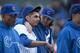 CHICAGO, IL - APRIL 12: Relief pitcher James Russell #40 of the Chicago Cubs (R) hugs starting pitcher Matt Garza #22 after the game against the Milwaukee Brewers at Wrigley Field on April 12, 2012 in Chicago, Illinois. The The Cubs defeated the Brewers 8-0. (Photo by Brian Kersey/Getty Images)