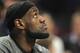 CHICAGO, IL - APRIL 12: LeBron James #6 of the Miami Heat watches a Chicago Bulls highlight video before a game against the Bulls at the United Center on April 12, 2012 in Chicago, Illinois. NOTE TO USER: User expressly acknowledges and agrees that, by downloading and or using this photograph, User is consenting to the terms and conditions of the Getty Images License Agreement. (Photo by Jonathan Daniel/Getty Images)