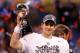 INDIANAPOLIS, IN - FEBRUARY 05: Eli Manning #10 of the New York Giants celebrates with the Vince Lombardi trophy after the Giants won 21-17 against the New England Patriots during Super Bowl XLVI at Lucas Oil Stadium on February 5, 2012 in Indianapolis, Indiana. (Photo by Rob Carr/Getty Images)