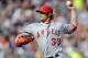 MINNEAPOLIS, MN - APRIL 9: C.J. Wilson #33 of the Los Angeles Angels of Anaheim delivers a pitch in the third inning against the Minnesota Twins during the home opener on April 9, 2012 at Target Field in Minneapolis, Minnesota. The Angels defeated the Twins 5-1. (Photo by Hannah Foslien/Getty Images)