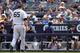 Phil Hughes walks off the mound in another disappointing outing against the Los Angeles Angels.
