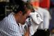 NEW YORK, NY - AUGUST 25: Phil Hughes #65 of the New York Yankees sits in the dugout during the third inning against the Oakland Athletics at Yankee Stadium on August 25, 2011 at Yankee Stadium in the Bronx borough of New York City. (Photo by Chris Trotman/Getty Images)