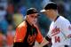 BALTIMORE, MD - AUGUST 14: Manager Buck Showalter congratulates Nolan Reimold #14 of the Baltimore Orioles after a 8-5 victory against the Detroit Tigers at Oriole Park at Camden Yards on August 14, 2011 in Baltimore, Maryland. (Photo by Greg Fiume/Getty Images)