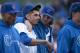 CHICAGO, IL - APRIL 12: Relief pitcher James Russell #40 of the Chicago Cubs (R) hugs starting pitcher Matt Garza #22 after the game against the Milwaukee Brewers at Wrigley Field on April 12, 2012 in Chicago, Illinois. The The Cubs defeated the Brewers 8-0. (Photo by Brian Kersey/Getty Images)