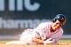 BOSTON, MA - APRIL 13: Jacoby Ellsbury #2 of the Boston Red Sox reacts after he was injured in a double play in the bottom of the fourth inning against the Tampa Bay Rays during the home opener on April 13, 2012 at Fenway Park in Boston, Massachusetts. (Photo by Elsa/Getty Images)