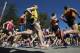 HOPKINTON, MA - APRIL 18: Runners head out during the start of the 115th Boston Marathon on April 18, 2011 in Hopkinton, Massachusetts. (Photo by Elsa/Getty Images)