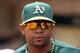 OAKLAND, CA - APRIL 11: Yoenis Cespedes #52 of the Oakland Athletics stands in the dugout before their game against the Kansas City Royals at O.co Coliseum on April 11, 2012 in Oakland, California. (Photo by Ezra Shaw/Getty Images)