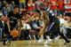 LAS VEGAS - DECEMBER 17: Tre'Von Willis #33 of the UNLV Rebels goes for a steal between Damian Lillard #1 and Matt Washington #33 of the Weber State Wildcats during their game at the Thomas & Mack Center December 17, 2009 in Las Vegas, Nevada. (Photo by Ethan Miller/Getty Images)