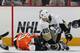 PHILADELPHIA, PA - APRIL 15: Arron Asham #45 of the Pittsburgh Penguins punches Brayden Schenn #10 of the Philadelphia Flyers in Game Three of the Eastern Conference Quarterfinals during the 2012 NHL Stanley Cup Playoffs at Wells Fargo Center on April 15, 2012 in Philadelphia, Pennsylvania. The Flyers defeated the Penguins 8-4. (Photo by Bruce Bennett/Getty Images)